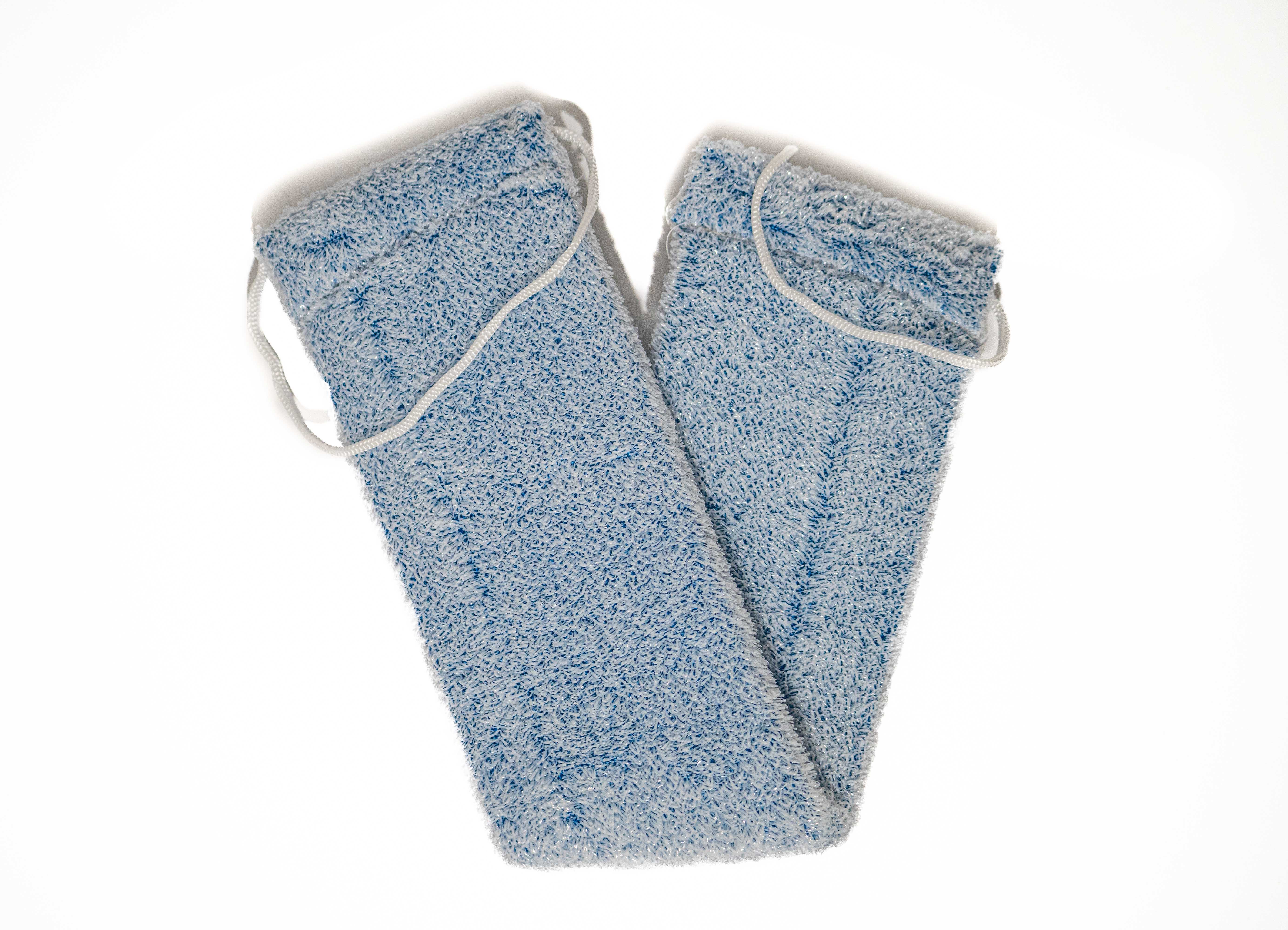 Pair of light blue bath sponges with hanging cords