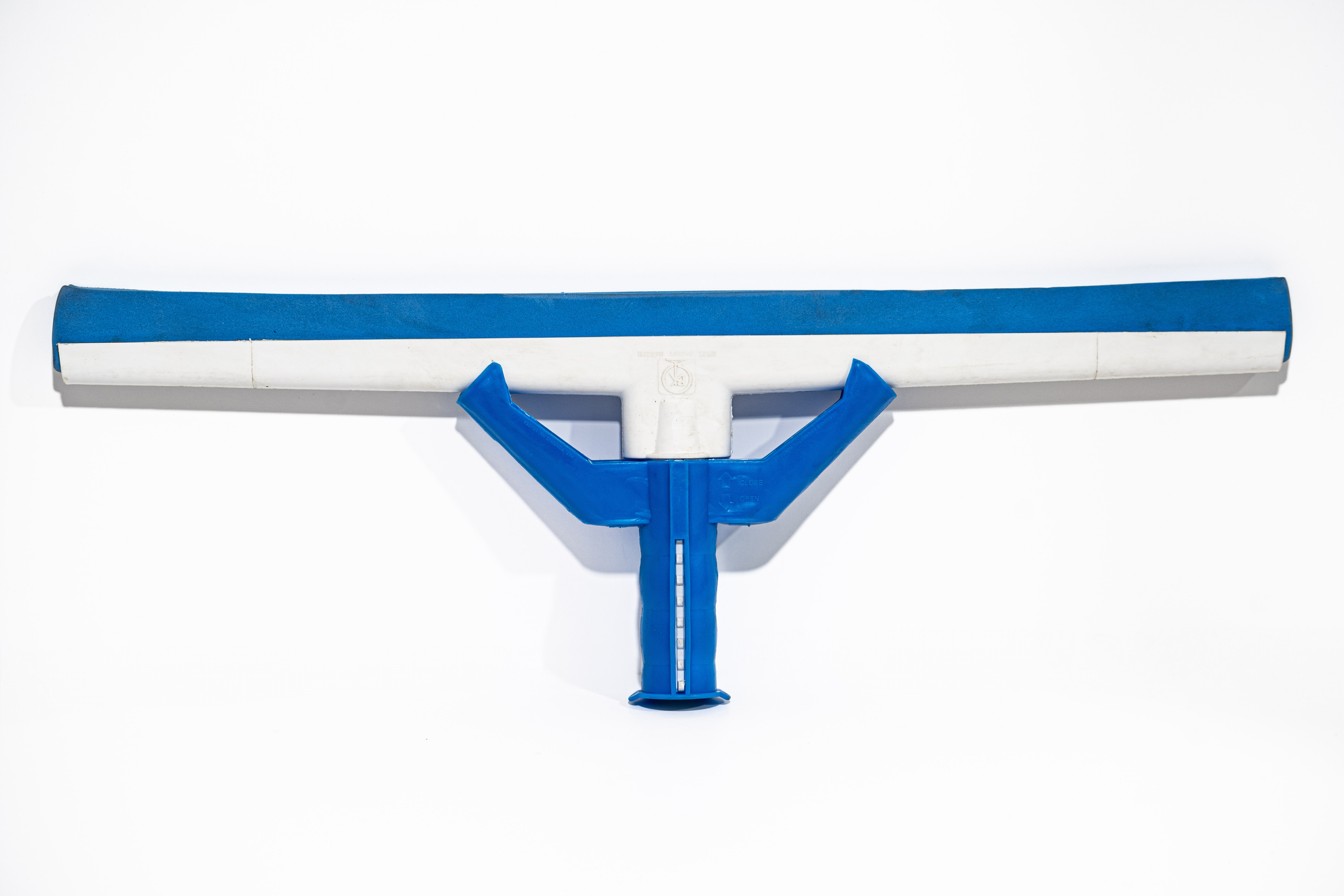 Blue and white floor squeegee head